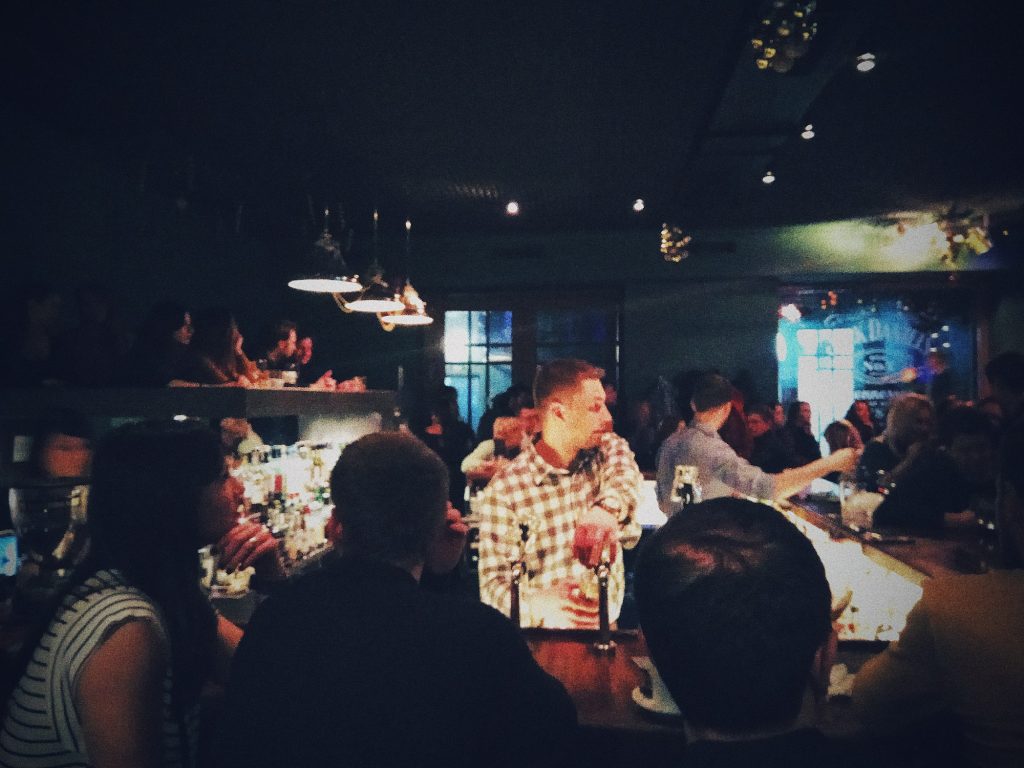 At the bar. People. Event