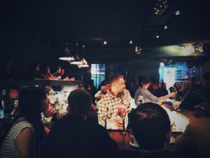 At the bar. People. Event